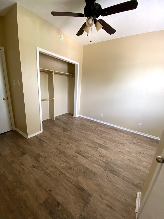 3316 Guadalupe Street, Unit 212 Austin, TX 78705 - Photo 16 of 22 wooden floor in an empty room