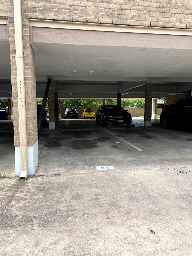3316 Guadalupe Street, Unit 212 Austin, TX 78705 - Photo 22 of 22 a view of garage with a window