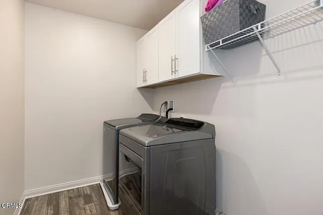 a bed room with a bed and a dresser