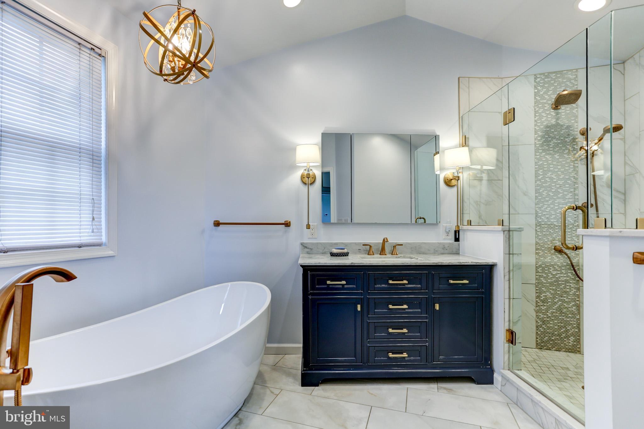508 Gale Road Camp Hill, PA 17011 - Photo 29 of 50 a spacious bathroom with a tub sink and mirror