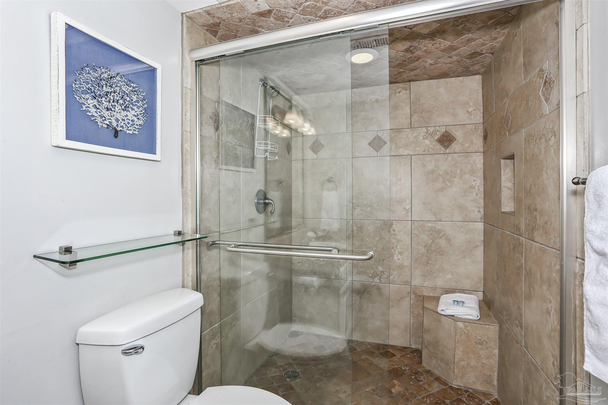 16285 Perdido Key Drive, Unit 424 Pensacola, FL 32507 - Photo 18 of 53 a bathroom with a shower and toilet