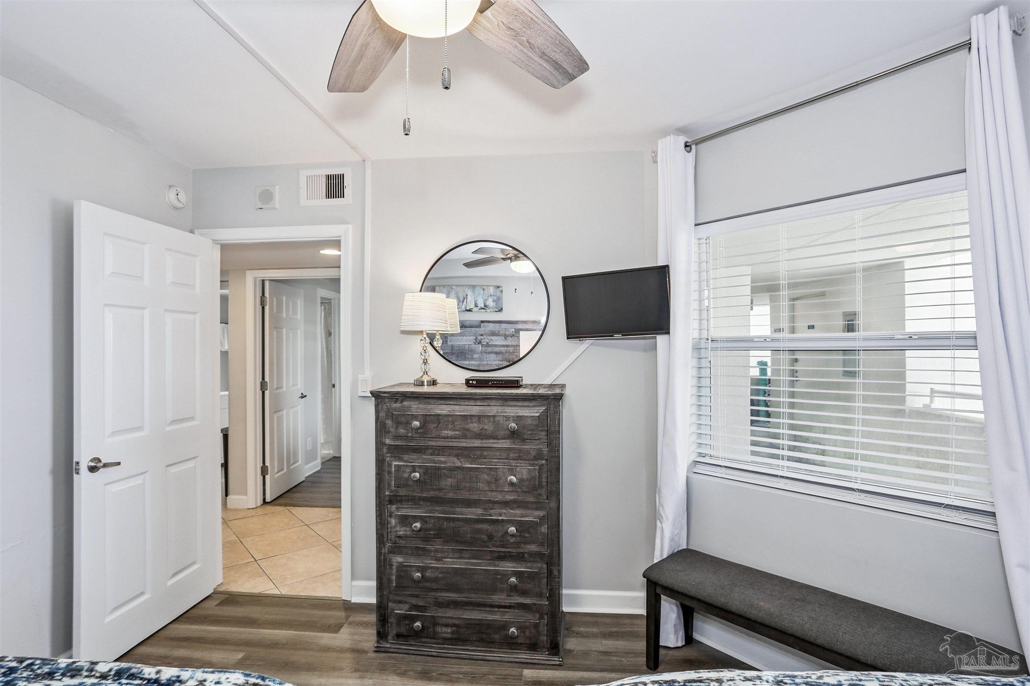 16285 Perdido Key Drive, Unit 424 Pensacola, FL 32507 - Photo 19 of 53 a view of walk in closet with window