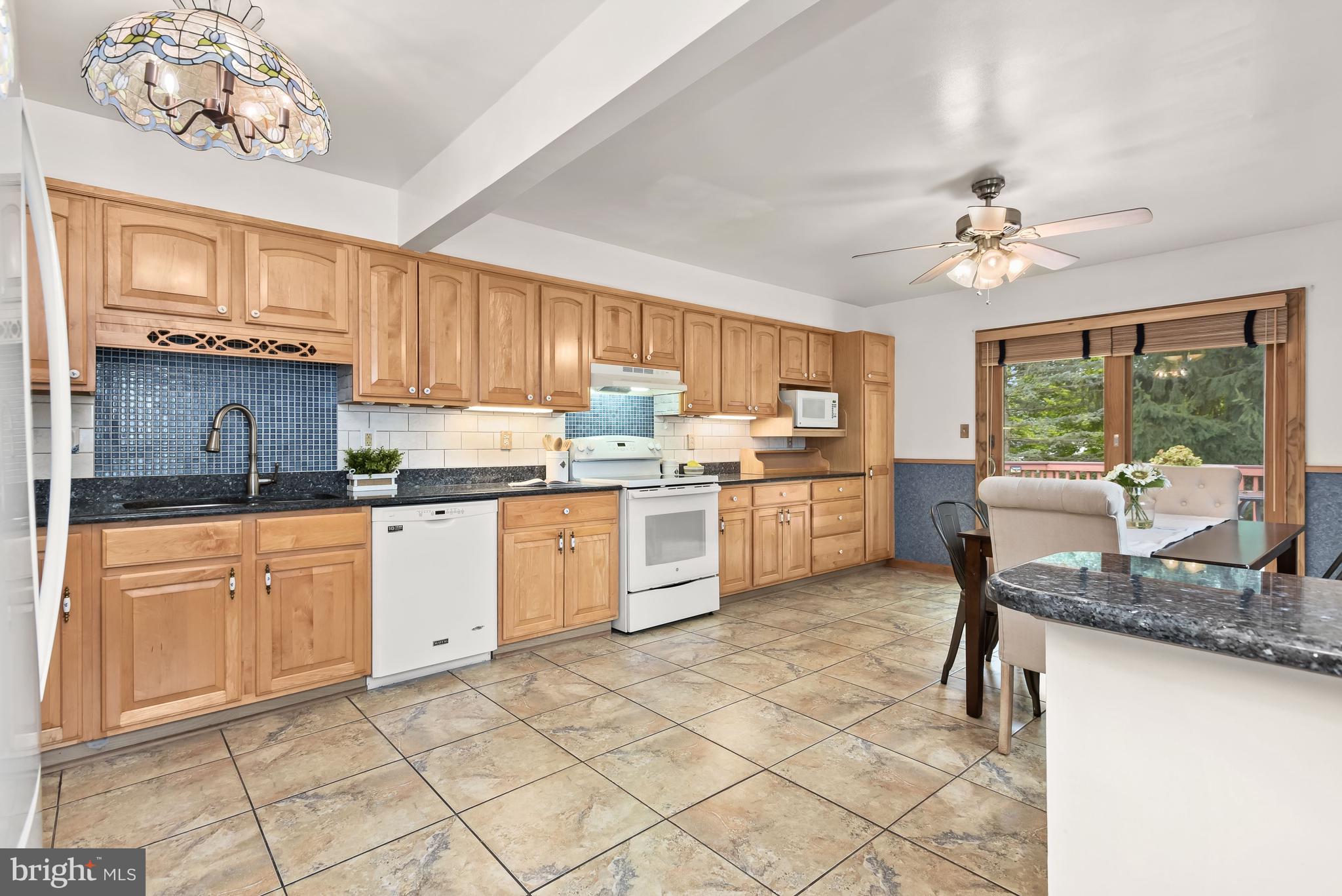 121 Tulip Drive Gaithersburg, MD 20877 - Photo 10 of 58 Deck access from the spacious kitchen