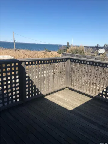 a view of a balcony with an outdoor space