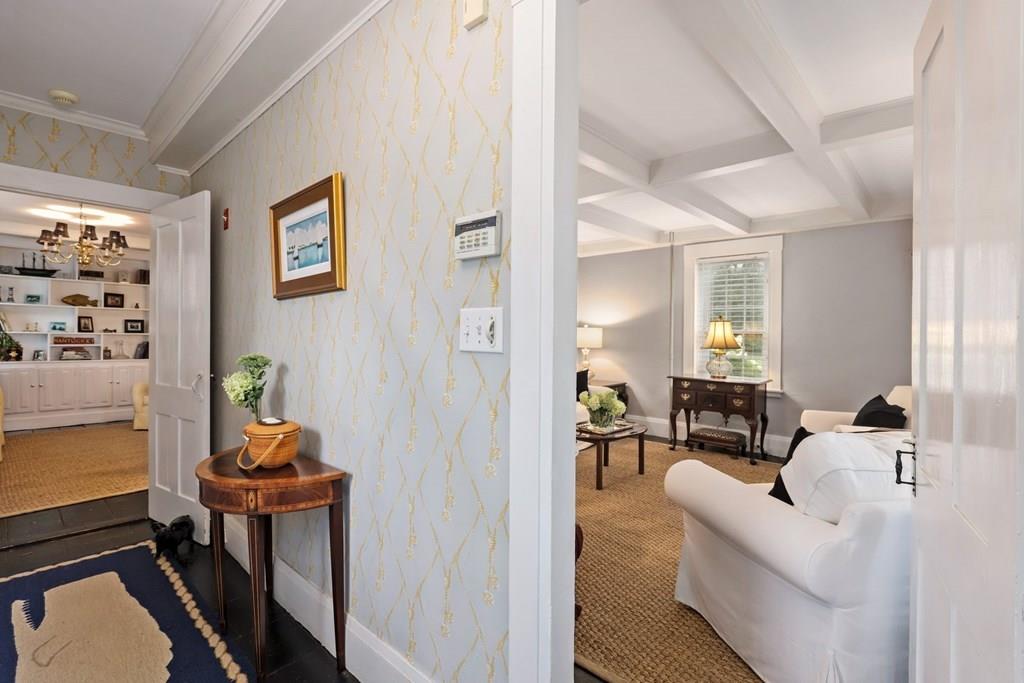 434 Main Street Amesbury, MA 01913 - Photo 11 of 40 a living room with furniture and a potted plant