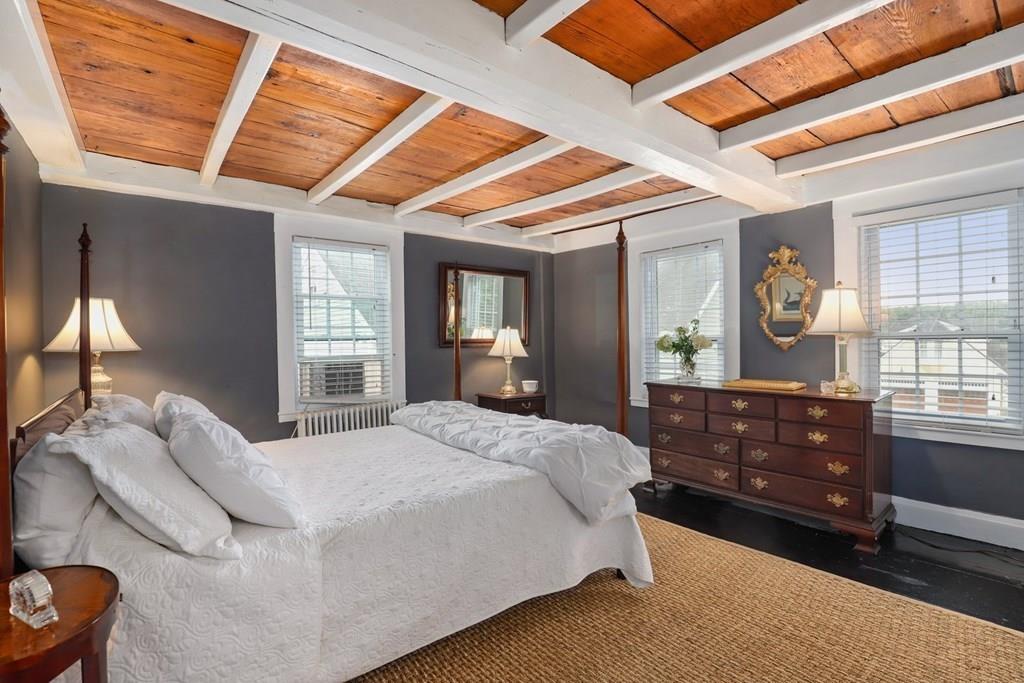 434 Main Street Amesbury, MA 01913 - Photo 18 of 40 a bed room with a bed and a window