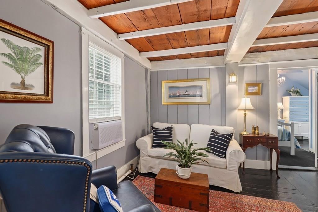 434 Main Street Amesbury, MA 01913 - Photo 23 of 40 a living room with furniture and a potted plant