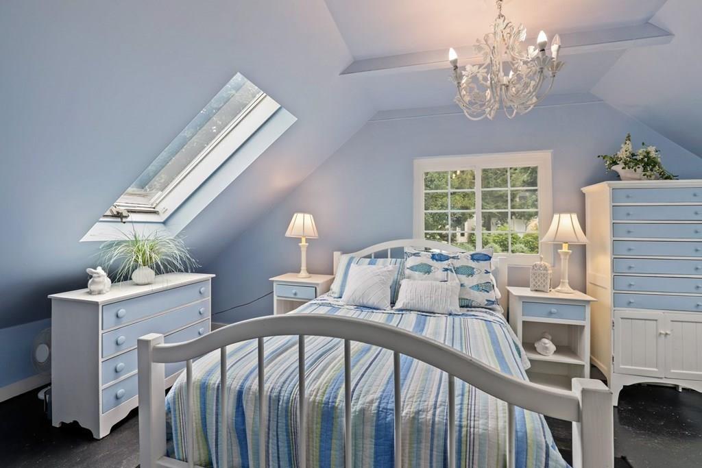 434 Main Street Amesbury, MA 01913 - Photo 27 of 40 a view of a balcony with furniture and chandelier