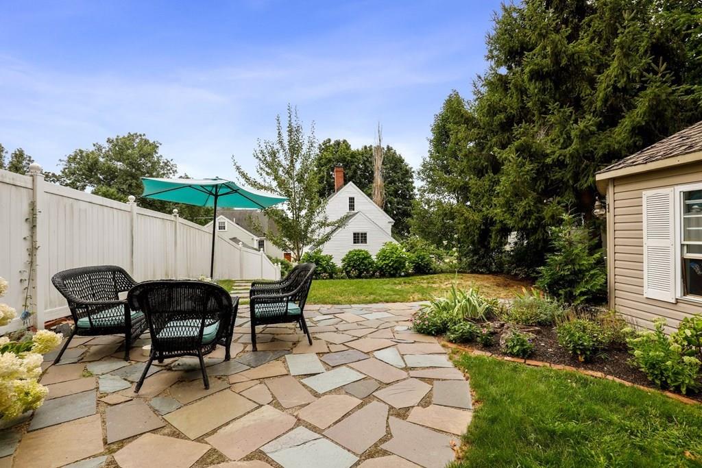 434 Main Street Amesbury, MA 01913 - Photo 38 of 40 a view of a chairs and table in backyard