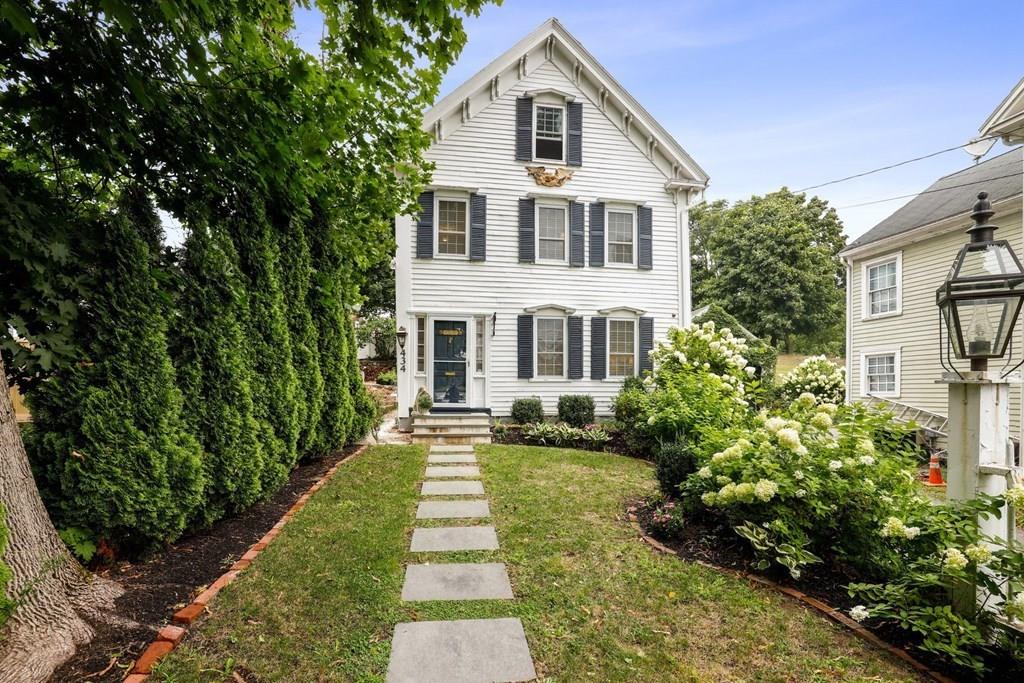 434 Main Street Amesbury, MA 01913 - Photo 39 of 40 a front view of a house with a yard