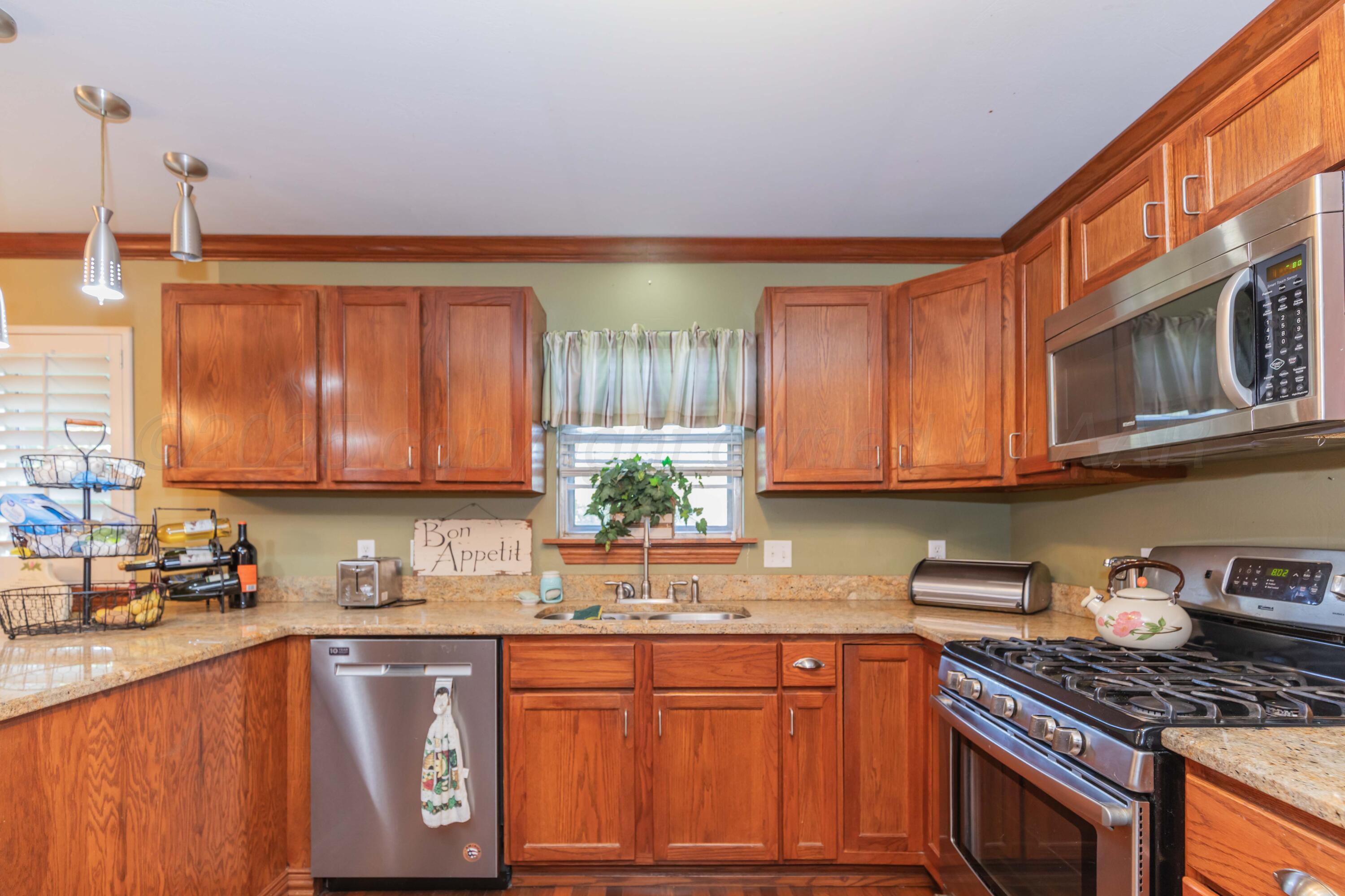 105 Pratt Street Claude, TX 79019 - Photo 14 of 42 KITCHEN VIEW 1