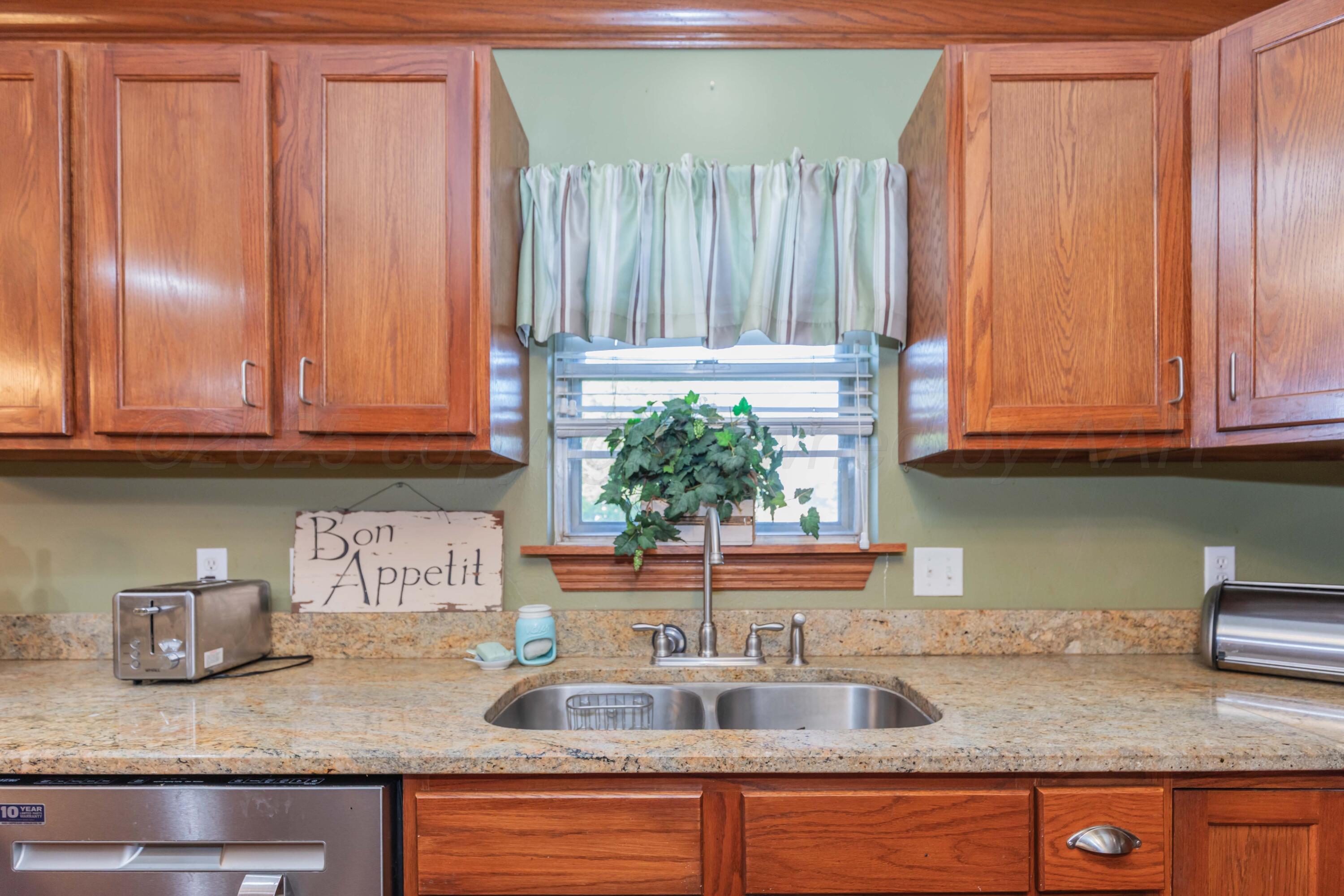 105 Pratt Street Claude, TX 79019 - Photo 15 of 42 KITCHEN VIEW 2