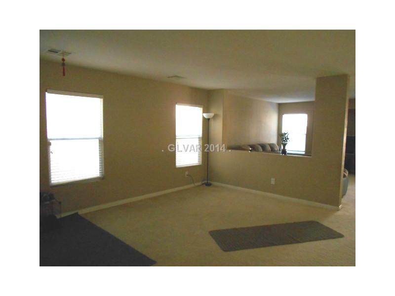 8657 Palomino Ranch Street Las Vegas, NV 89131 - Photo 3 of 15 Dining Room. Formal dining off of entry way