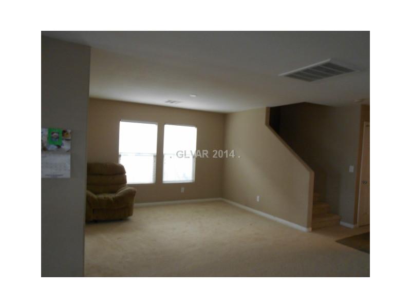 8657 Palomino Ranch Street Las Vegas, NV 89131 - Photo 4 of 15 Living Room.