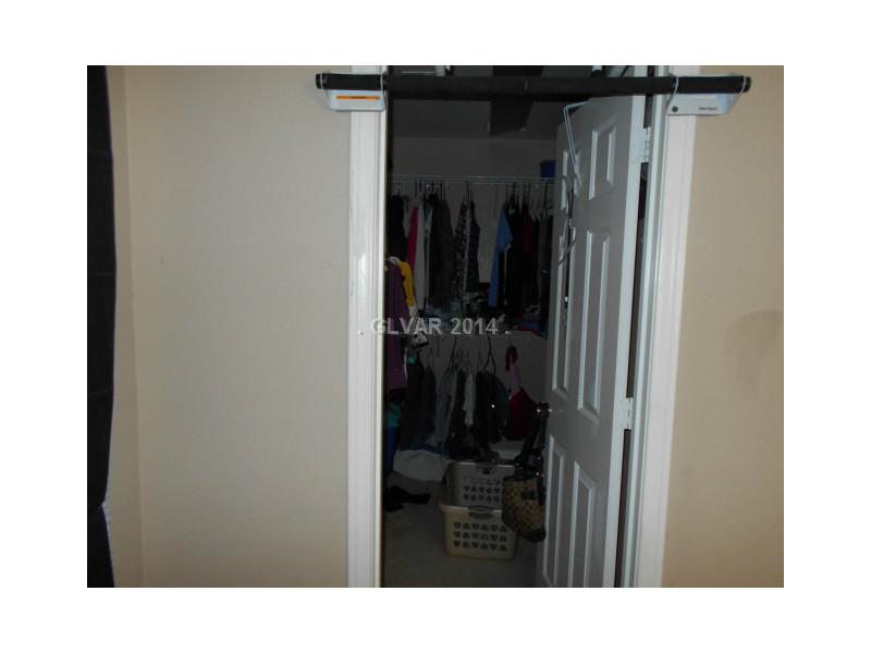 8657 Palomino Ranch Street Las Vegas, NV 89131 - Photo 9 of 15 Master Bedroom. Large walk-in closet