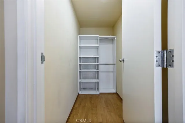 a view of an empty walk in closet