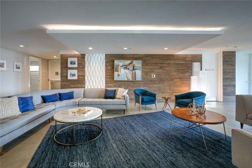 525 East Seaside Way, Unit 704 Long Beach, CA 90802 - Photo 30 of 38 a living room with furniture and a wooden floor