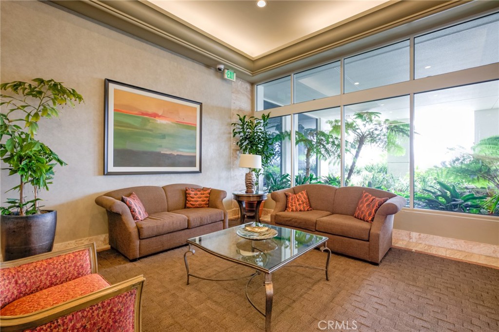 525 East Seaside Way, Unit 704 Long Beach, CA 90802 - Photo 32 of 38 a living room with furniture and a large window