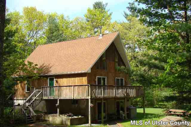 671 Buck Road Accord, NY 12404 - Photo 1 of 7 a view of a house with a backyard