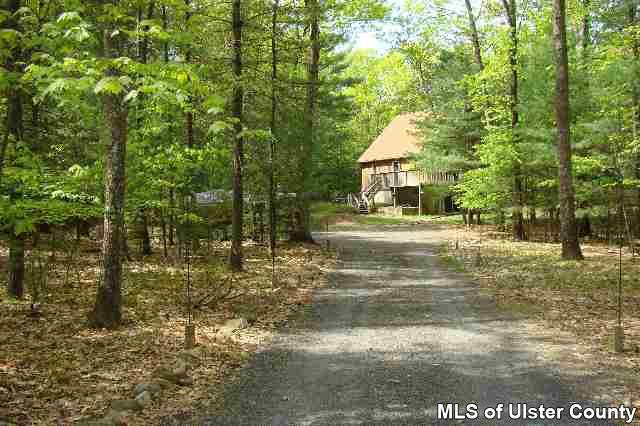 671 Buck Road Accord, NY 12404 - Photo 2 of 7 a view of house with trees in the background