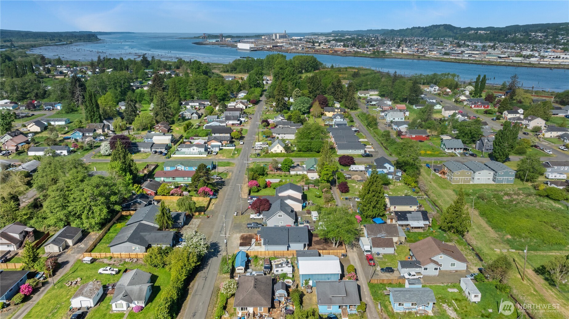 1010 MacFarlane Street Aberdeen, WA 98520 - Photo 26 of 28 an aerial view of lake and residential houses with outdoor space