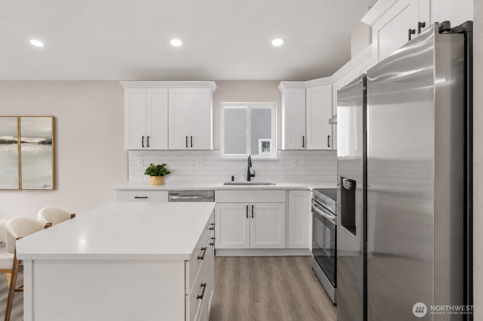 1010 MacFarlane Street Aberdeen, WA 98520 - Photo 6 of 28 a kitchen with a sink appliances and cabinets
