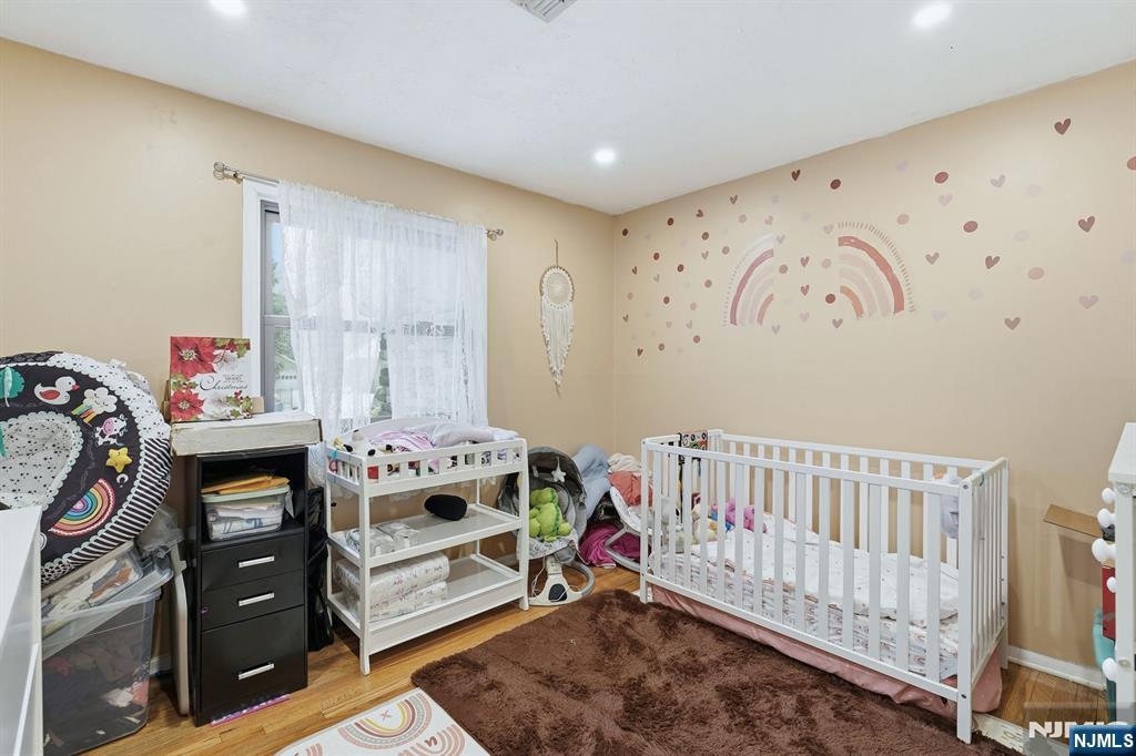 587 Marlboro Road Old Bridge, NJ 08857 - Photo 16 of 36 a bedroom with a bed and a window