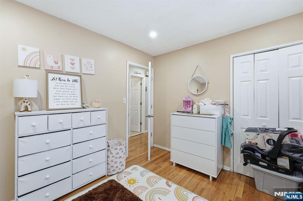 587 Marlboro Road Old Bridge, NJ 08857 - Photo 17 of 36 a room with a dresser and a mirror