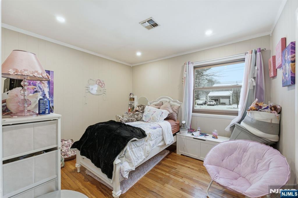 587 Marlboro Road Old Bridge, NJ 08857 - Photo 19 of 36 a bed room with a bed and a window