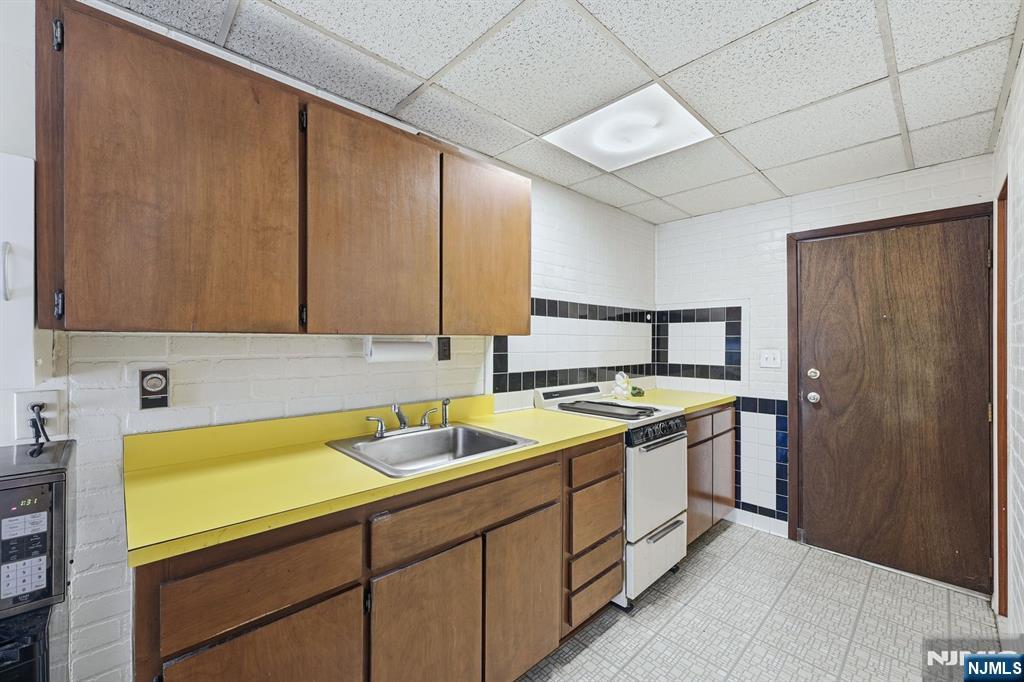 587 Marlboro Road Old Bridge, NJ 08857 - Photo 24 of 36 a kitchen with a sink and cabinets