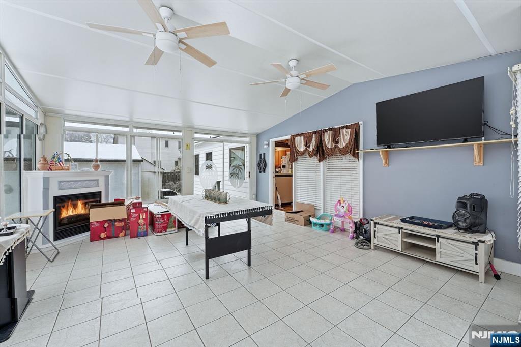 587 Marlboro Road Old Bridge, NJ 08857 - Photo 5 of 36 a bedroom with furniture and a flat screen tv