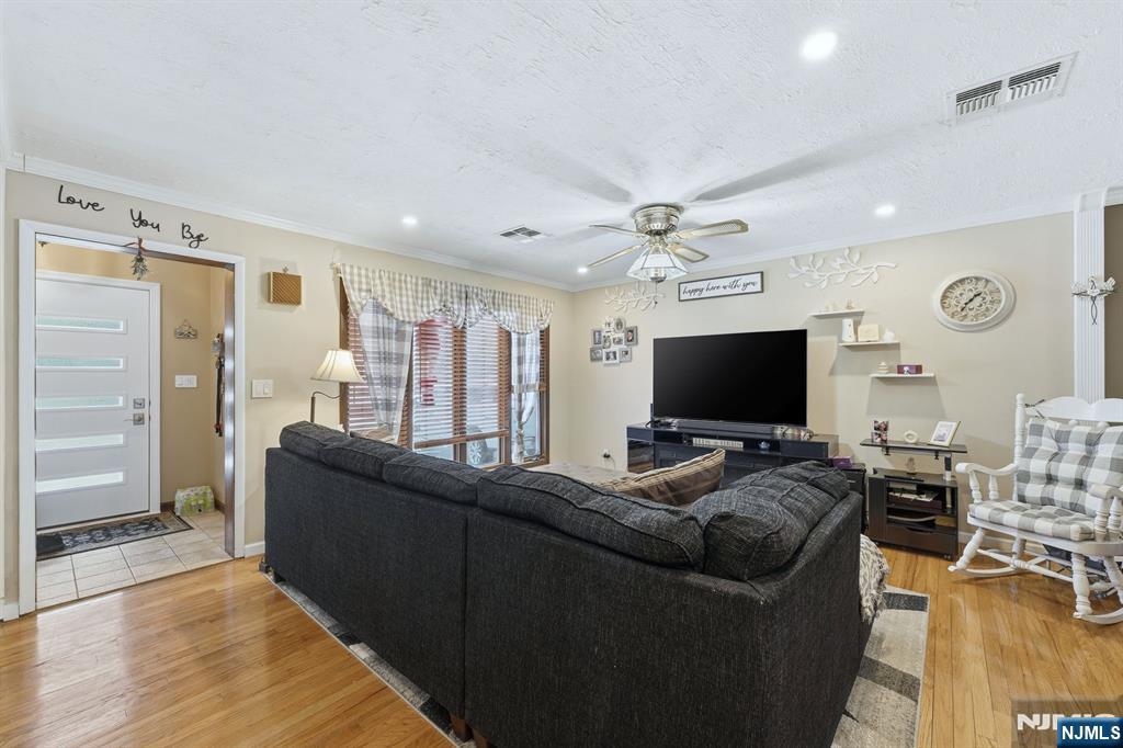 587 Marlboro Road Old Bridge, NJ 08857 - Photo 8 of 36 a living room with furniture and a flat screen tv