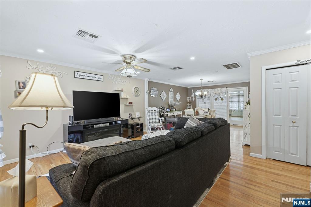 587 Marlboro Road Old Bridge, NJ 08857 - Photo 9 of 36 a living room with furniture and a flat screen tv