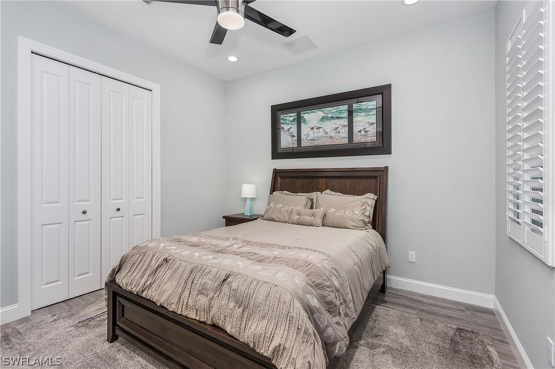 2743 Janet Street Cape Coral, FL 33993 - Photo 21 of 35 a large bed in a white room