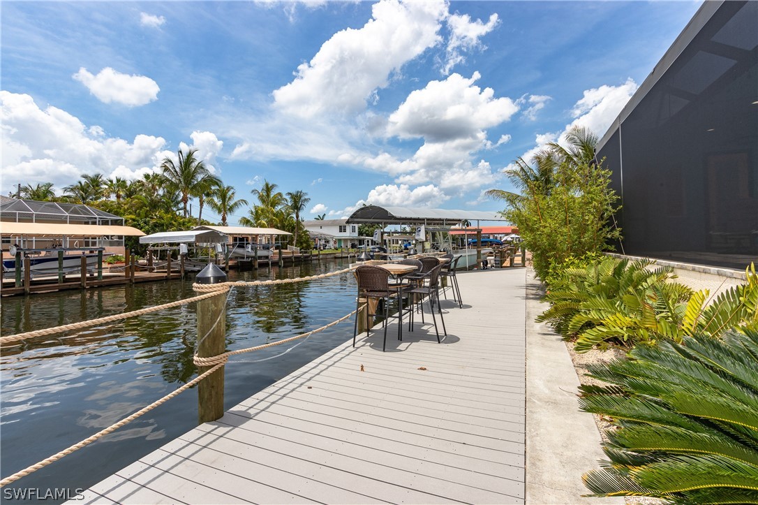 2743 Janet Street Cape Coral, FL 33993 - Photo 30 of 35 a view of a balcony with chairs
