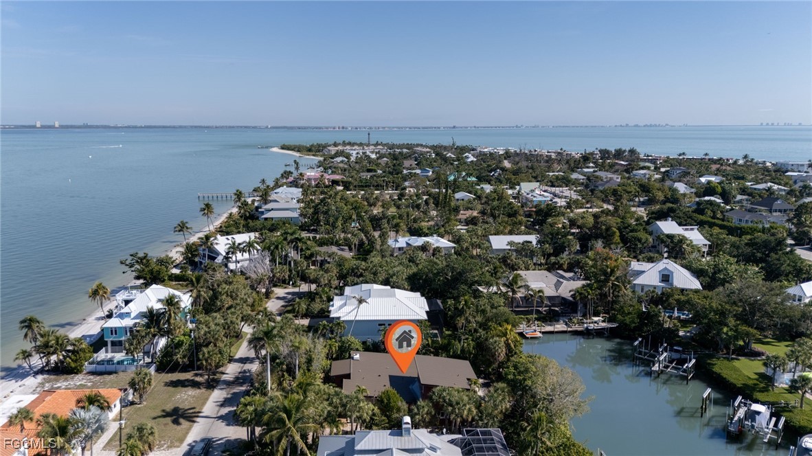 505 Lighthouse Way Sanibel, FL 33957 - Photo 2 of 11 an aerial view of a city with lots of residential buildings