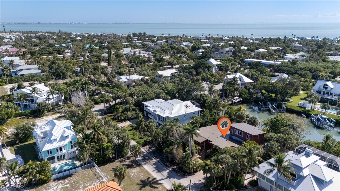 505 Lighthouse Way Sanibel, FL 33957 - Photo 10 of 11 an aerial view of a city and mountain view in back
