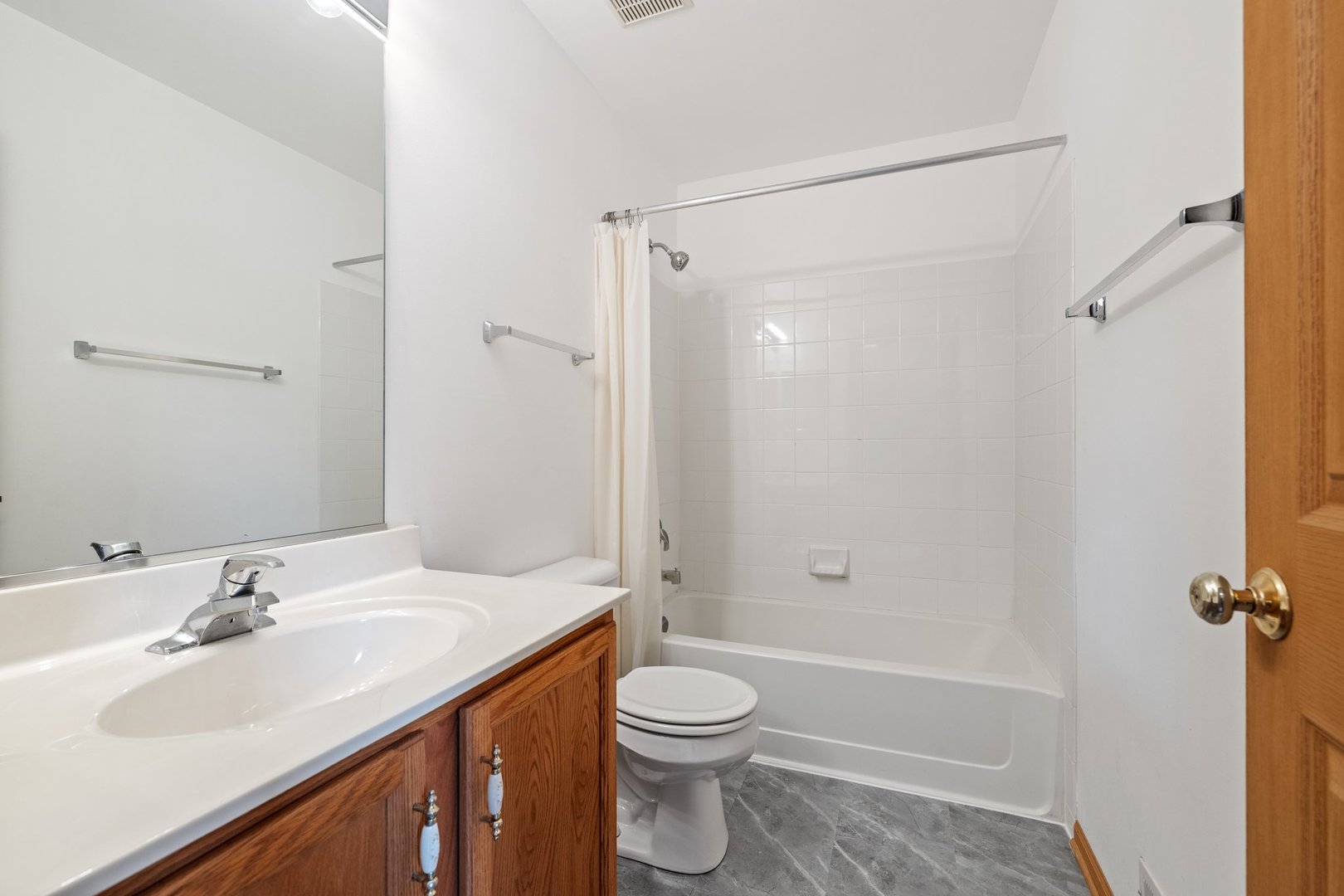2442 Oneida Lane Naperville, IL 60563 - Photo 20 of 23 a bathroom with a sink toilet and shower