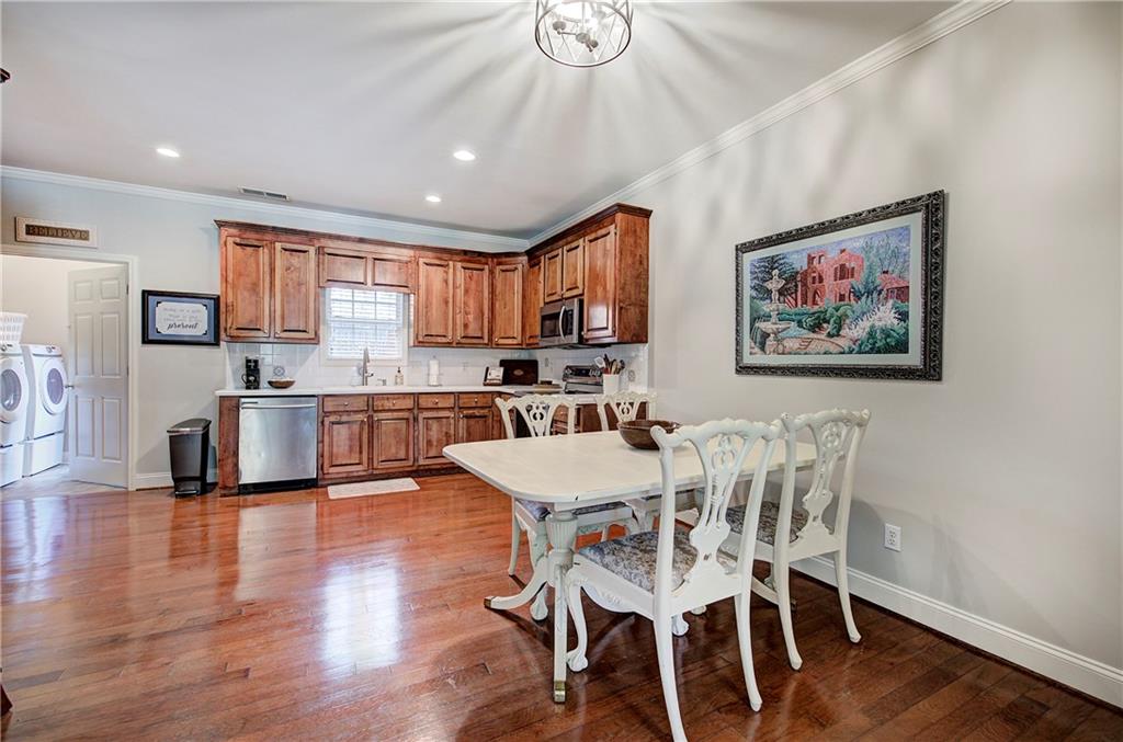 618 Manor Way Cartersville, GA 30120 - Photo 11 of 35 a view of kitchen with cabinets and wooden floor