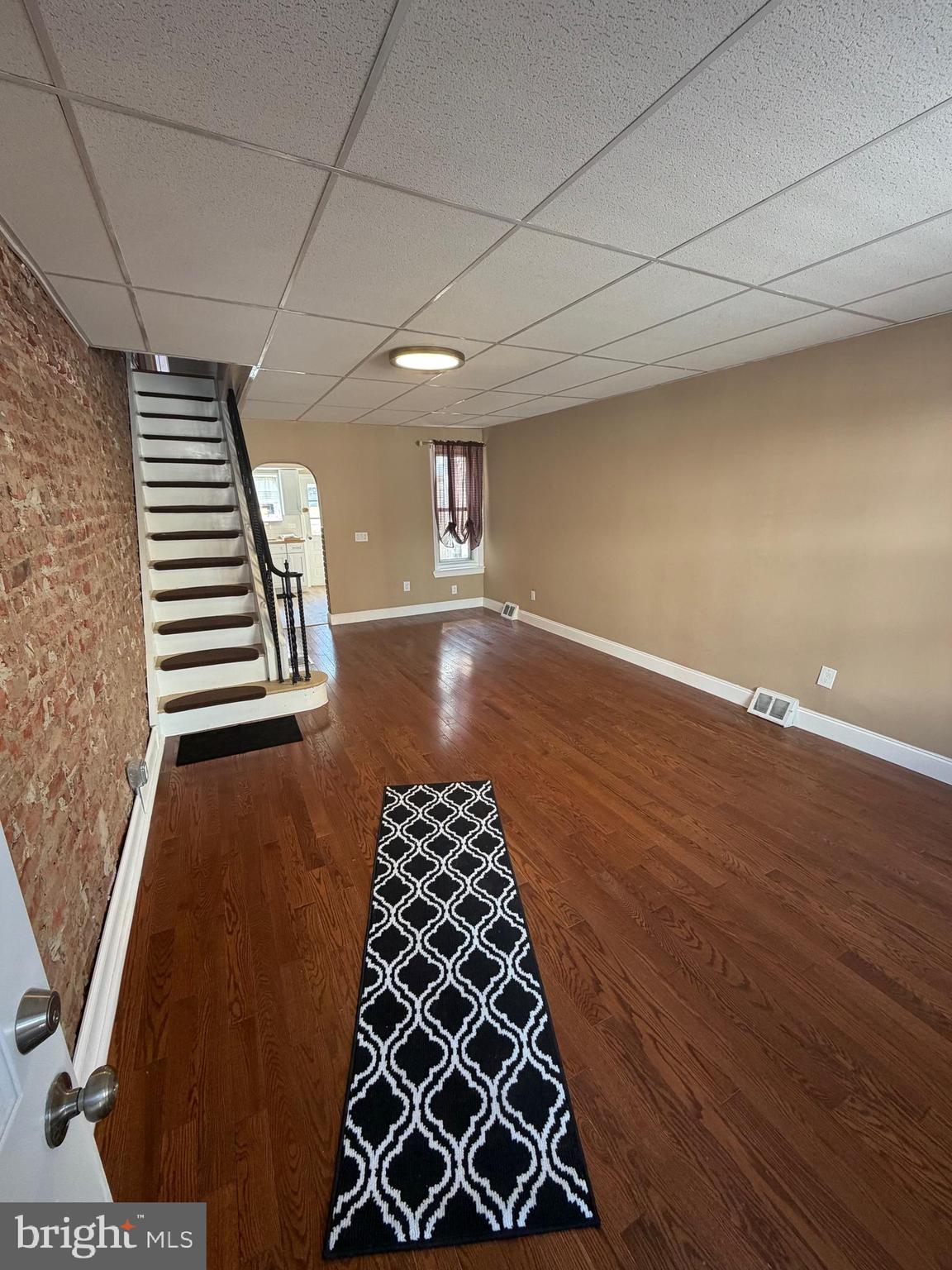 3429 Tilton Street Philadelphia, PA 19134 - Photo 2 of 23 an empty room with wooden floor