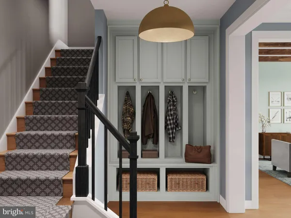 a view of staircase with white walls and railing