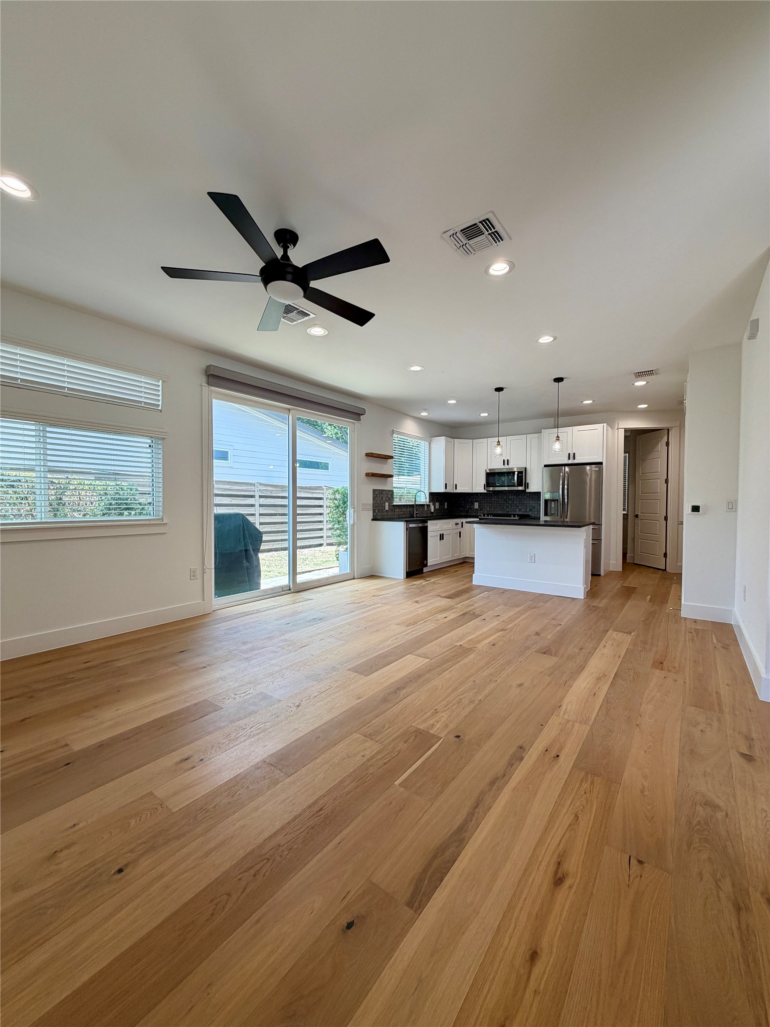 6102 Ponca Street, Unit 2 Austin, TX 78741 - Photo 8 of 24 Living Room/Kitchen