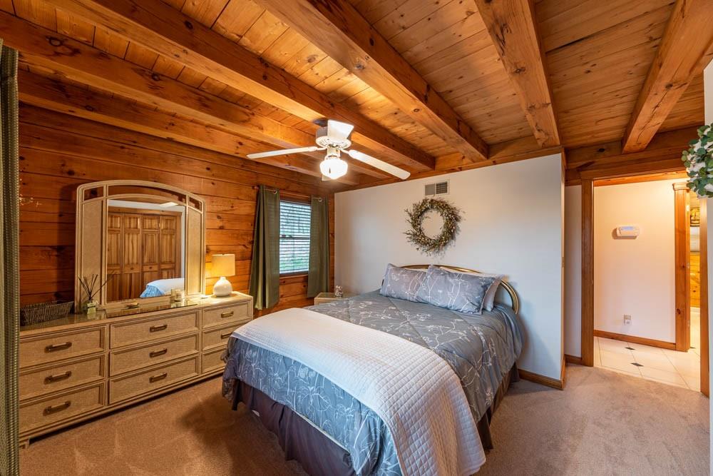 155 Glade Run Road Mars, PA 16046 - Photo 14 of 25 a bedroom with a large bed and a dresser