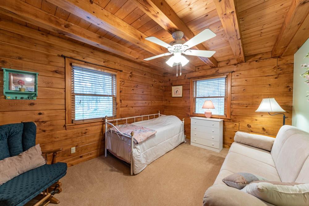 155 Glade Run Road Mars, PA 16046 - Photo 15 of 25 a spacious bedroom with a bed and a couch