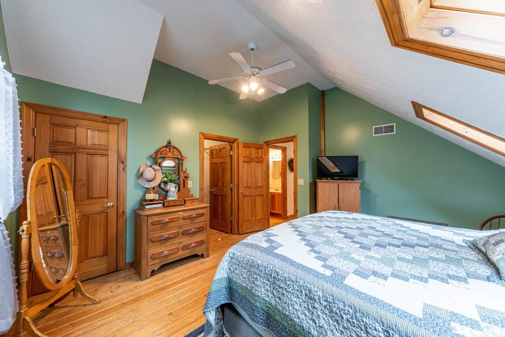 155 Glade Run Road Mars, PA 16046 - Photo 17 of 25 a bedroom with a bed and a dresser