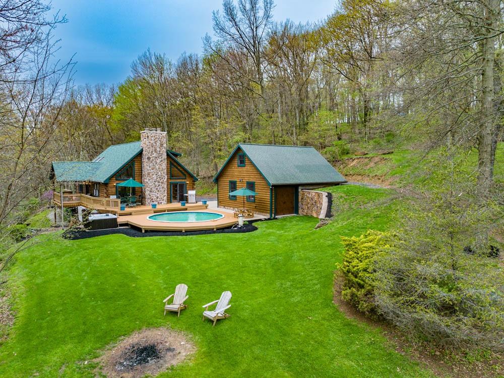 155 Glade Run Road Mars, PA 16046 - Photo 22 of 25 a front view of a house with garden