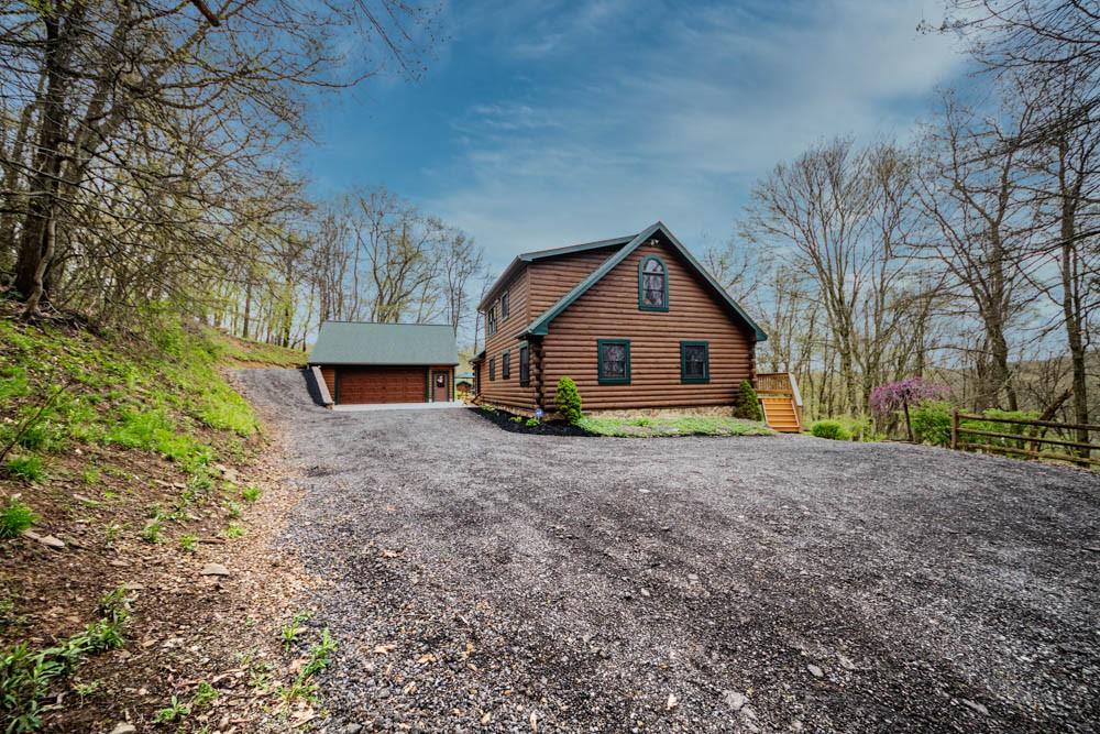 155 Glade Run Road Mars, PA 16046 - Photo 24 of 25 a view of a house with a yard and large trees