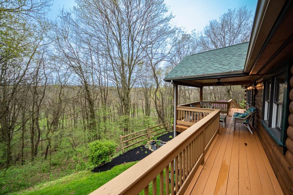 155 Glade Run Road Mars, PA 16046 - Photo 7 of 25 a balcony with wooden floor and outdoor seating