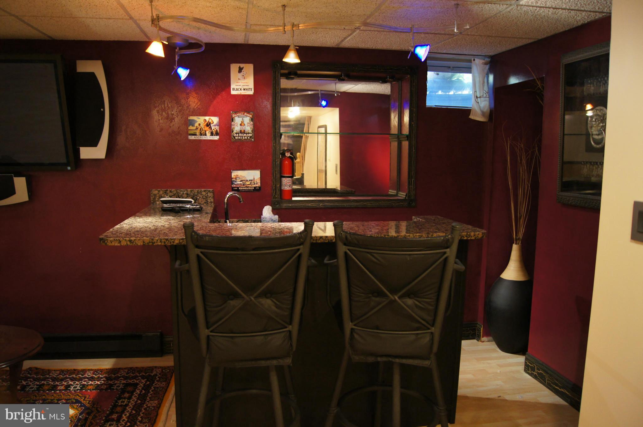 332 Aigburth Road Towson, MD 21286 - Photo 25 of 30 Granite bar in corner of family room