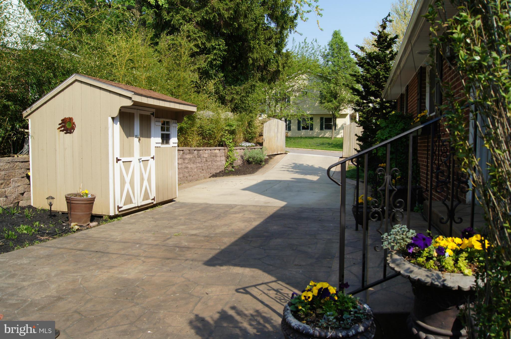 332 Aigburth Road Towson, MD 21286 - Photo 30 of 30 Stamped patio, long driveway.